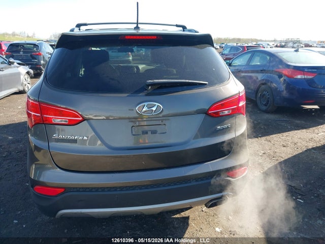 12610396 :رقم المزاد ، 5XYZT3LB1DG069910 vin ، 2013 Hyundai Santa Fe مزاد بيع