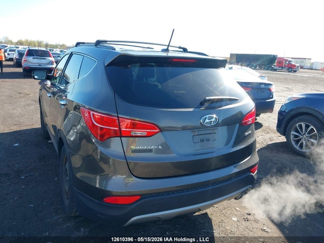 12610396 :رقم المزاد ، 5XYZT3LB1DG069910 vin ، 2013 Hyundai Santa Fe مزاد بيع