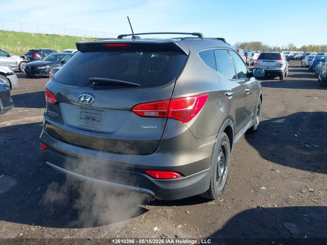 12610396 :رقم المزاد ، 5XYZT3LB1DG069910 vin ، 2013 Hyundai Santa Fe مزاد بيع