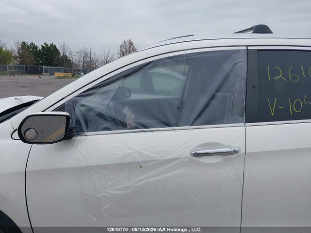12610778 :رقم المزاد ، 2HKRM4H90DH104731 vin ، 2013 Honda Cr-v Touring مزاد بيع