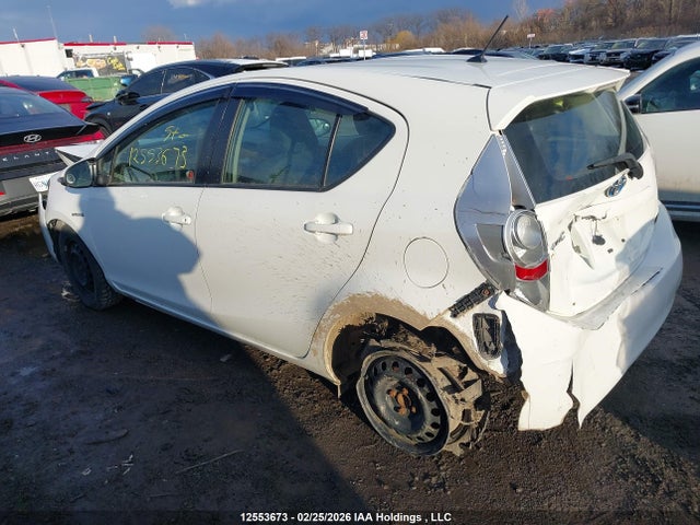 JTDKDTB31E1064023 Toyota PRIUS C