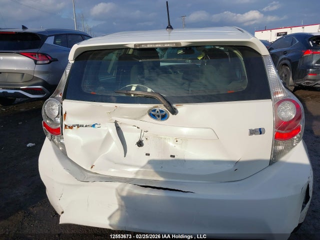 JTDKDTB31E1064023 Toyota PRIUS C