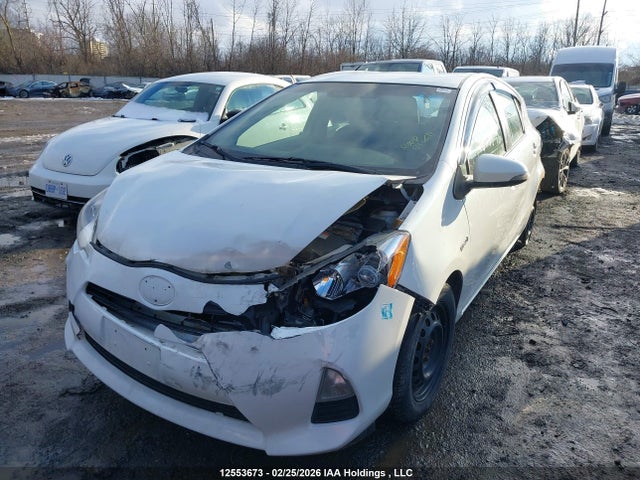 JTDKDTB31E1064023 Toyota PRIUS C