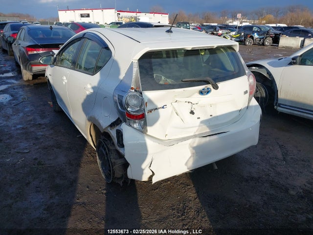 JTDKDTB31E1064023 Toyota PRIUS C