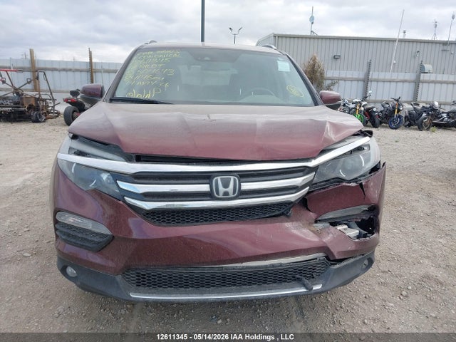 12611345 :رقم المزاد ، 5FNYF6H94JB504643 vin ، 2018 Honda Pilot Touring مزاد بيع