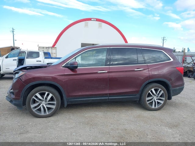 12611345 :رقم المزاد ، 5FNYF6H94JB504643 vin ، 2018 Honda Pilot Touring مزاد بيع
