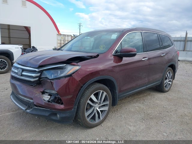 12611345 :رقم المزاد ، 5FNYF6H94JB504643 vin ، 2018 Honda Pilot Touring مزاد بيع