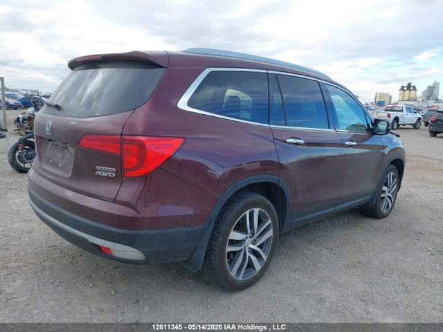 12611345 :رقم المزاد ، 5FNYF6H94JB504643 vin ، 2018 Honda Pilot Touring مزاد بيع