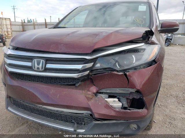 12611345 :رقم المزاد ، 5FNYF6H94JB504643 vin ، 2018 Honda Pilot Touring مزاد بيع