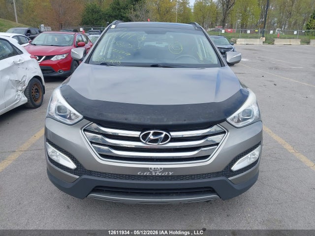 12611934 :رقم المزاد ، 5XYZUDLA6FG258257 vin ، 2015 Hyundai Santa Fe مزاد بيع
