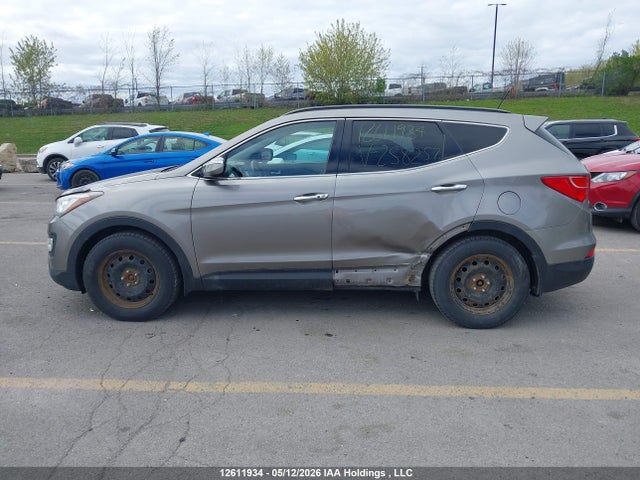 12611934 :رقم المزاد ، 5XYZUDLA6FG258257 vin ، 2015 Hyundai Santa Fe مزاد بيع