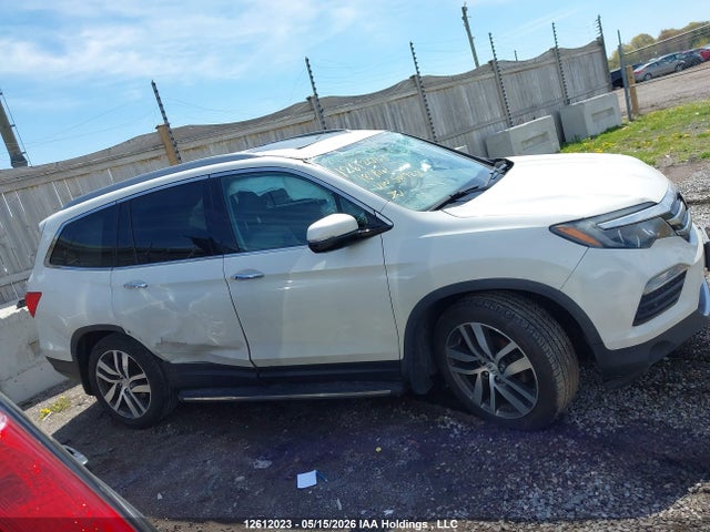 2018 Honda Pilot Touring მანქანა იყიდება აუქციონზე, vin: 5FNYF6H96JB501923, აუქციონის ნომერი: 12612023