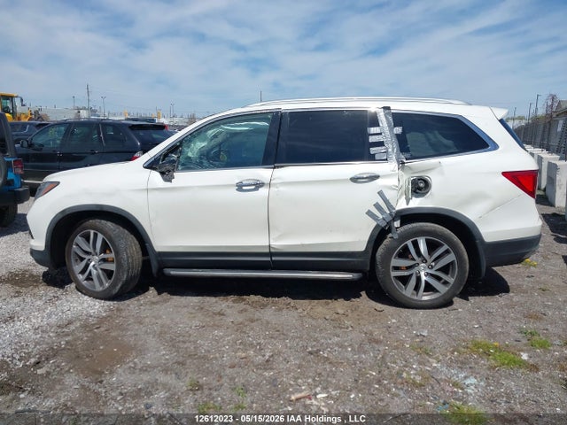 2018 Honda Pilot Touring მანქანა იყიდება აუქციონზე, vin: 5FNYF6H96JB501923, აუქციონის ნომერი: 12612023
