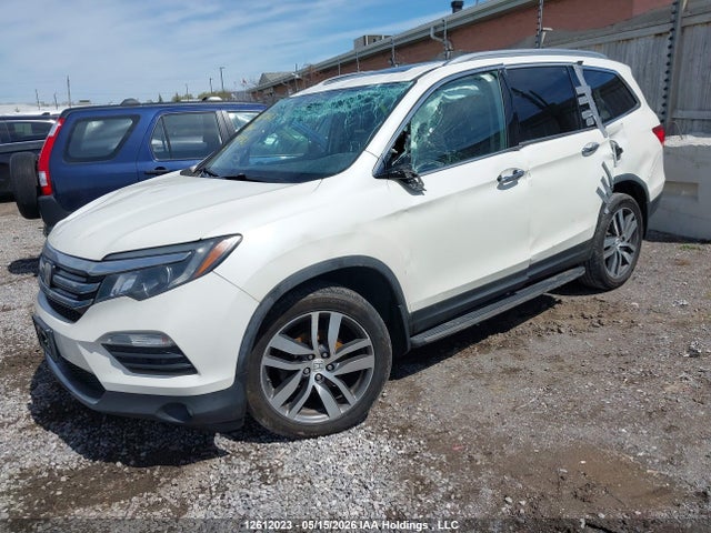 2018 Honda Pilot Touring მანქანა იყიდება აუქციონზე, vin: 5FNYF6H96JB501923, აუქციონის ნომერი: 12612023