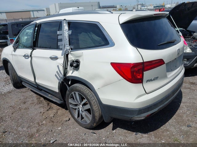 2018 Honda Pilot Touring მანქანა იყიდება აუქციონზე, vin: 5FNYF6H96JB501923, აუქციონის ნომერი: 12612023