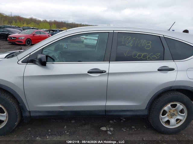 2HKRM3H35GH000603 Honda CR-V LX
