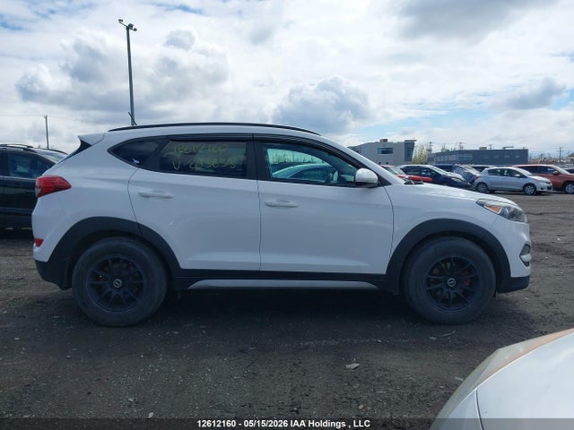KM8J3CA40HU263653 Hyundai TUCSON SE