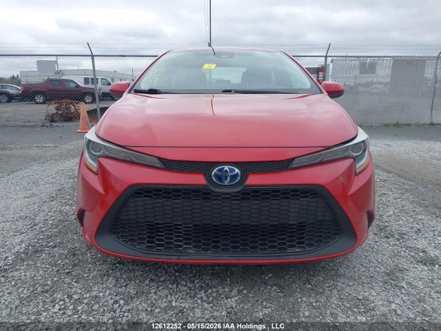 12612252 :رقم المزاد ، JTDBAMDE6MJ010017 vin ، 2021 Toyota Corolla Hybrid Base W/li Battery مزاد بيع