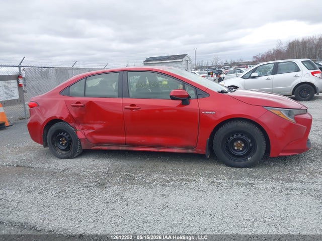 12612252 :رقم المزاد ، JTDBAMDE6MJ010017 vin ، 2021 Toyota Corolla Hybrid Base W/li Battery مزاد بيع