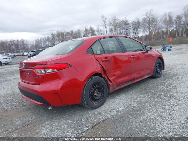 12612252 :رقم المزاد ، JTDBAMDE6MJ010017 vin ، 2021 Toyota Corolla Hybrid Base W/li Battery مزاد بيع