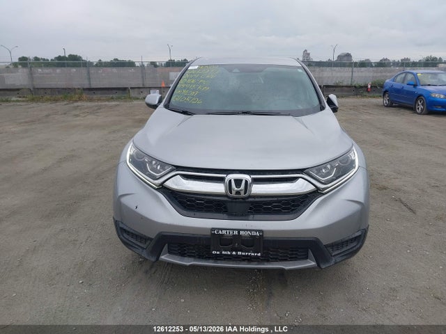 12612253 :رقم المزاد ، 2HKRW2H23KH106990 vin ، 2019 Honda Cr-v Lx مزاد بيع
