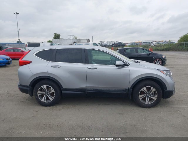 12612253 :رقم المزاد ، 2HKRW2H23KH106990 vin ، 2019 Honda Cr-v Lx مزاد بيع
