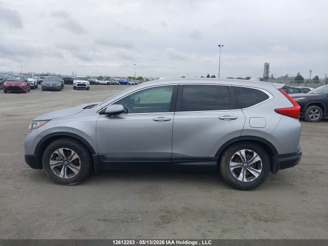12612253 :رقم المزاد ، 2HKRW2H23KH106990 vin ، 2019 Honda Cr-v Lx مزاد بيع