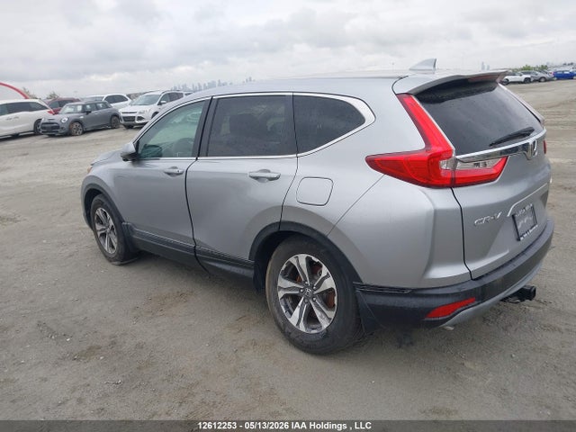 12612253 :رقم المزاد ، 2HKRW2H23KH106990 vin ، 2019 Honda Cr-v Lx مزاد بيع