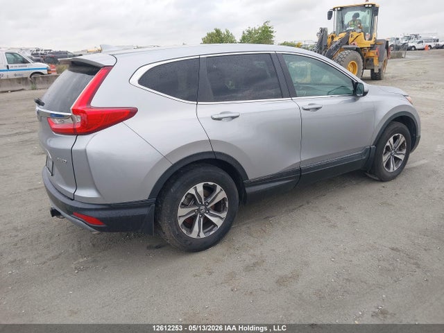 12612253 :رقم المزاد ، 2HKRW2H23KH106990 vin ، 2019 Honda Cr-v Lx مزاد بيع