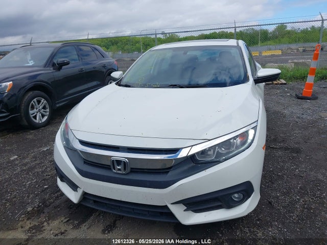 Продажа на аукционе авто 2016 Honda Civic Ex, vin: 2HGFC2F76GH001677, номер лота: 12612326