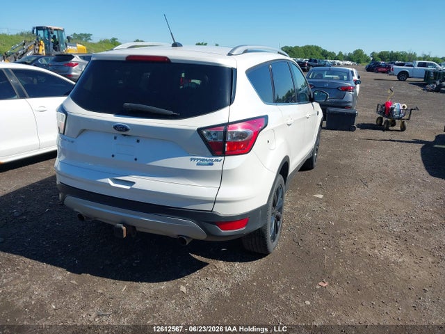 Продаж на аукціоні авто 2017 Ford Escape Titanium, vin: 1FMCU9J90HUD68469, номер лоту: 12612567
