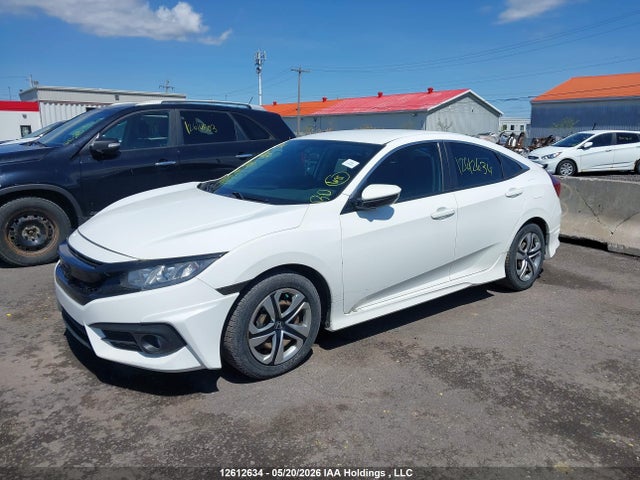 Продажа на аукционе авто 2017 Honda Civic Lx, vin: 2HGFC2E51HH012409, номер лота: 12612634