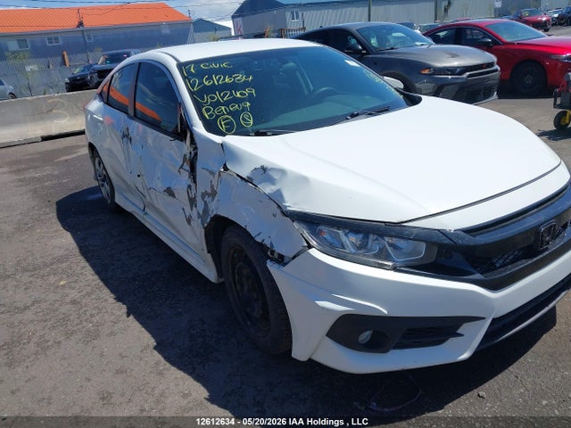 Продажа на аукционе авто 2017 Honda Civic Lx, vin: 2HGFC2E51HH012409, номер лота: 12612634