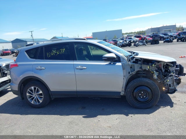 12613677 :رقم المزاد ، JTMRJREV5JD219446 vin ، 2018 Toyota Rav4 Hv Le Plus/xle مزاد بيع
