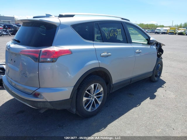12613677 :رقم المزاد ، JTMRJREV5JD219446 vin ، 2018 Toyota Rav4 Hv Le Plus/xle مزاد بيع