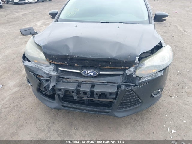 Продажа на аукционе авто 2013 Ford Focus Titanium, vin: 1FADP3J21DL256611, номер лота: 12601014