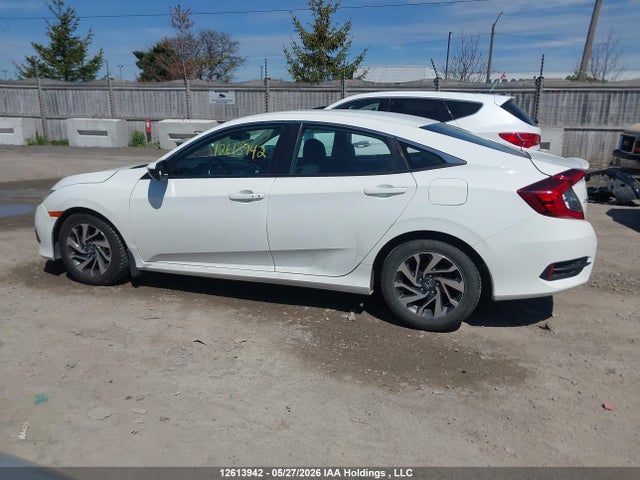 2HGFC2F61JH040059 Honda CIVIC SE