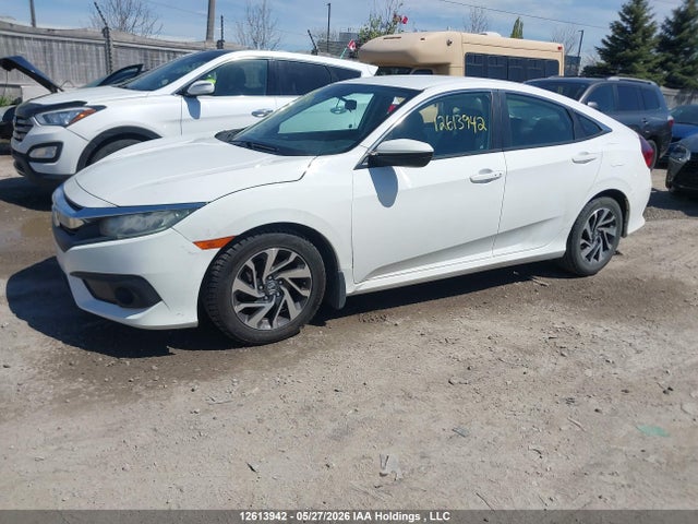 2HGFC2F61JH040059 Honda CIVIC SE