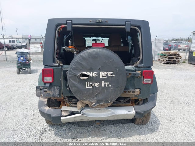 12614739 :رقم المزاد ، 1J4BA5H14BL604257 vin ، 2011 Jeep Wrangler Unlimited Sahara مزاد بيع