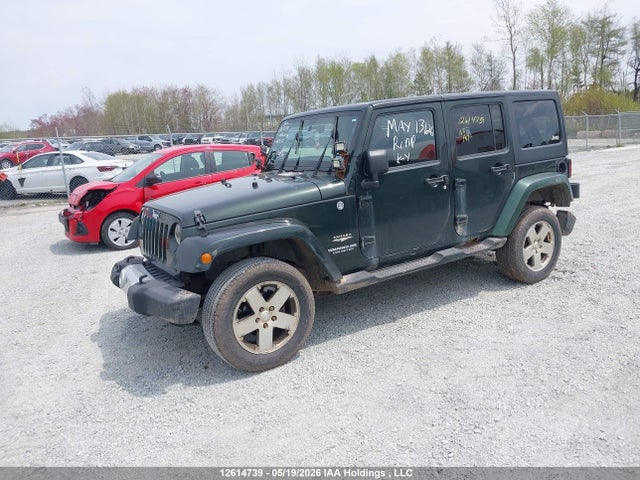 12614739 :رقم المزاد ، 1J4BA5H14BL604257 vin ، 2011 Jeep Wrangler Unlimited Sahara مزاد بيع