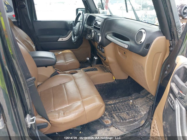 12614739 :رقم المزاد ، 1J4BA5H14BL604257 vin ، 2011 Jeep Wrangler Unlimited Sahara مزاد بيع