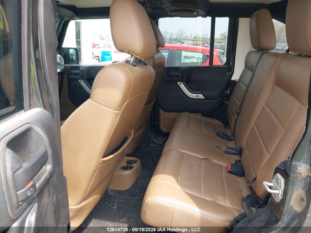12614739 :رقم المزاد ، 1J4BA5H14BL604257 vin ، 2011 Jeep Wrangler Unlimited Sahara مزاد بيع