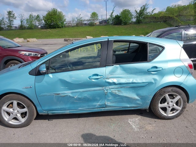 JTDKDTB36E1066513 Toyota PRIUS C