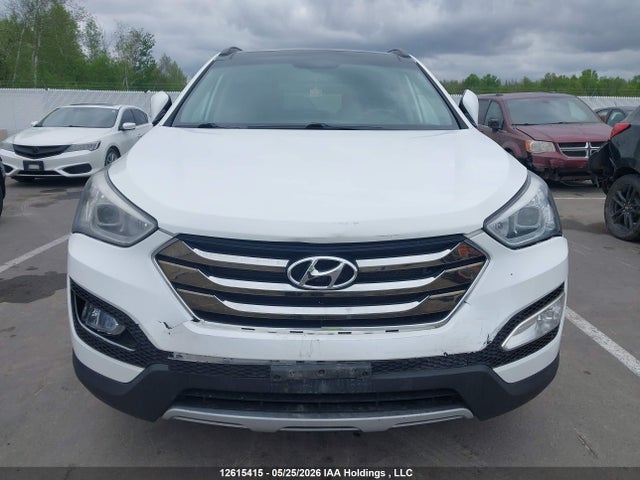12615415 :رقم المزاد ، 5XYZUDLB7EG153198 vin ، 2014 Hyundai Santa Fe Sport 2.4 Luxury مزاد بيع