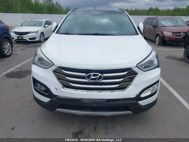 12615415 :رقم المزاد ، 5XYZUDLB7EG153198 vin ، 2014 Hyundai Santa Fe Sport 2.4 Luxury مزاد بيع