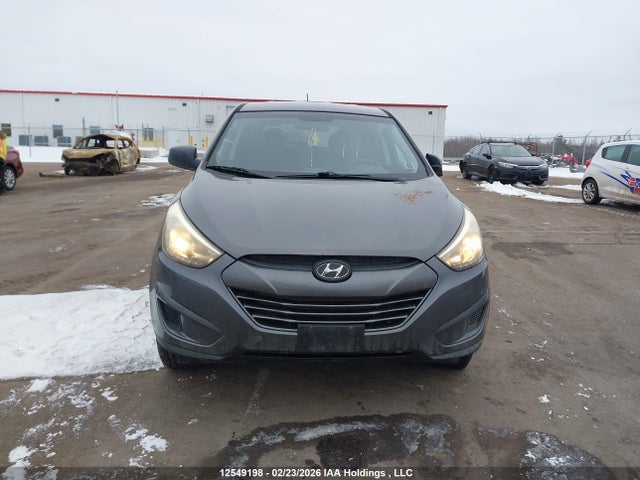 KM8JTCAF5EU852324 Hyundai Tucson Gl