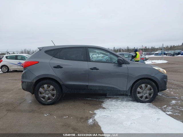 KM8JTCAF5EU852324 Hyundai Tucson Gl