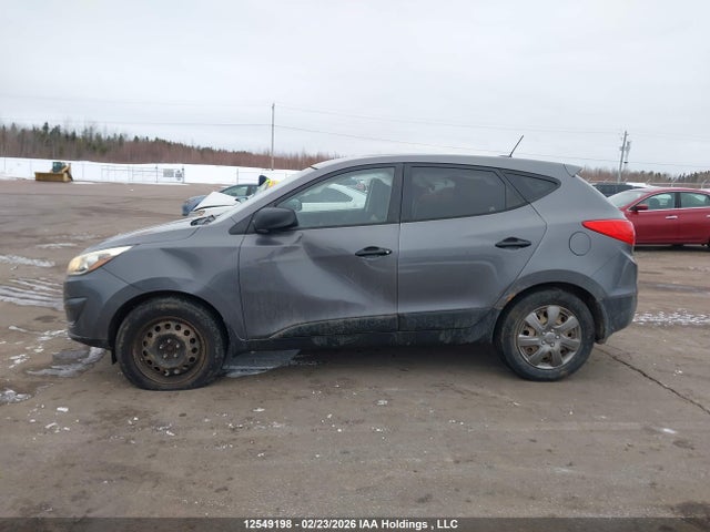KM8JTCAF5EU852324 Hyundai Tucson Gl