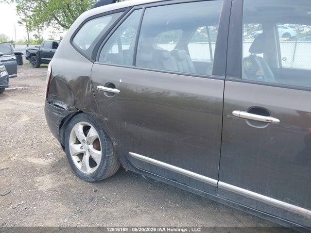 Продажа на аукционе авто 2009 Kia Rondo Lx/ex, vin: KNAFG526097285708, номер лота: 12616169