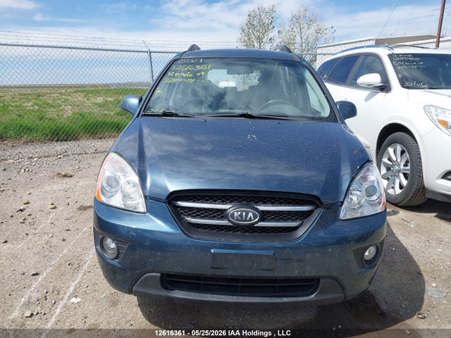 12616361 :رقم المزاد ، KNAFG528597229944 vin ، 2009 Kia Rondo Lx/ex مزاد بيع